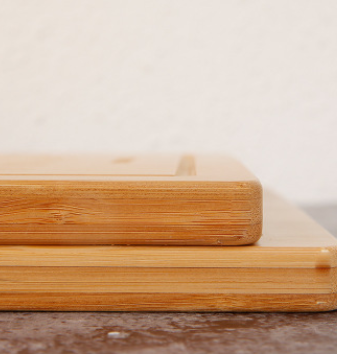 Joint pain symptoms? This bamboo cutting board is both gorgeous and practical, making it perfect for any kitchen, side  view